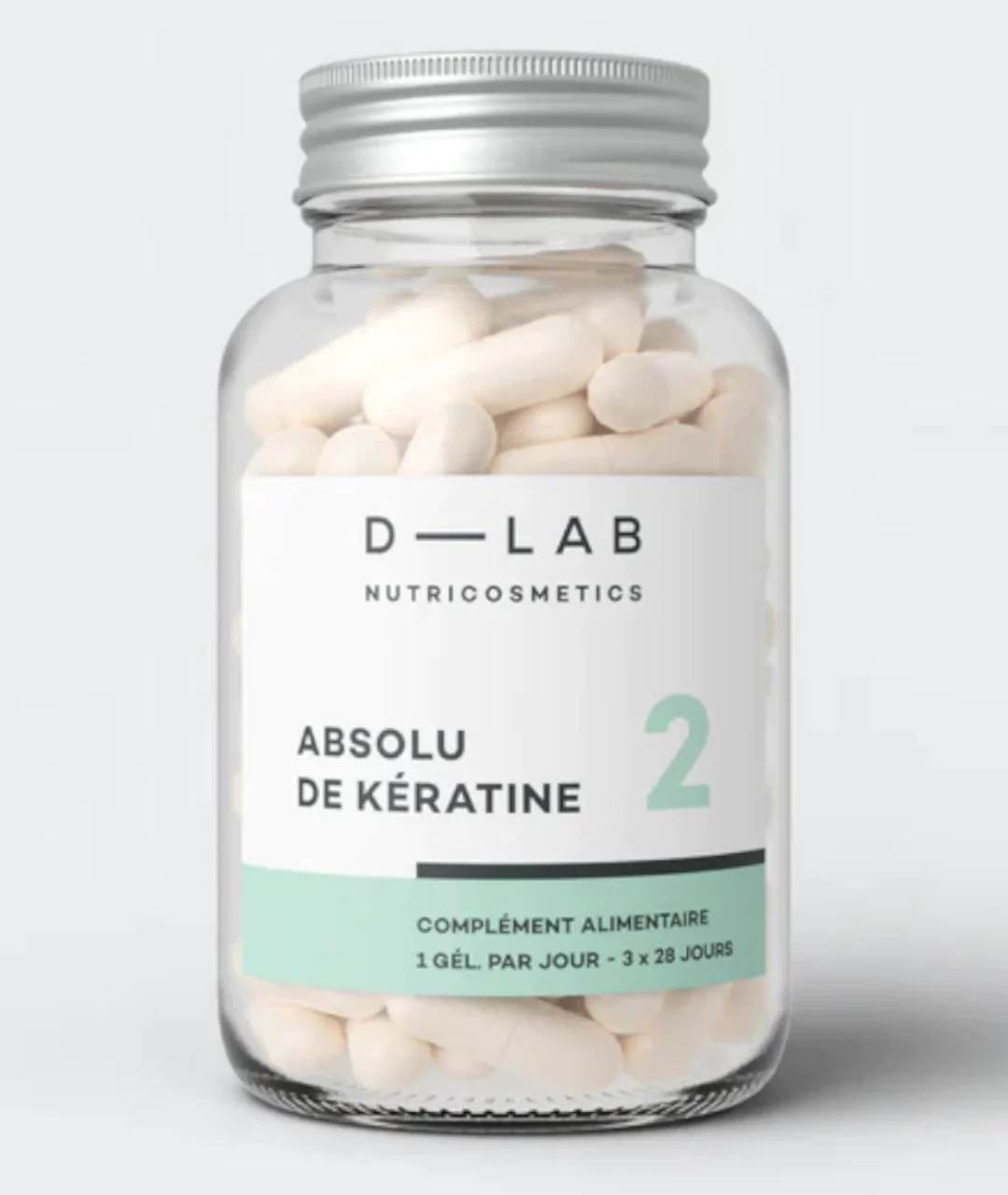 Pure Keratin - 84 capsules on a gray background close-up